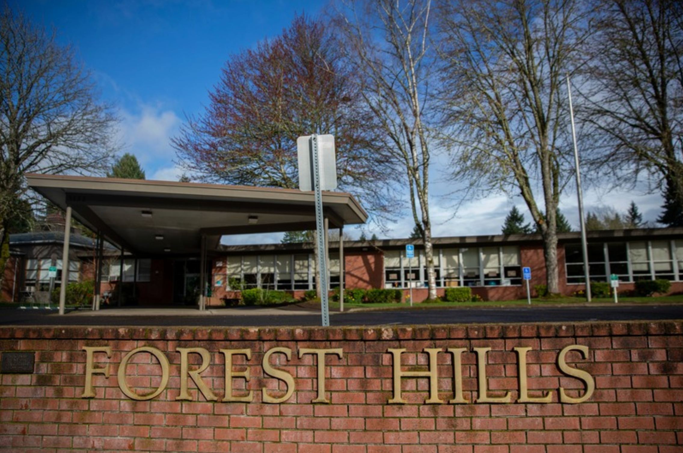 Forest Hills Elementary School building with brick exterior and trees